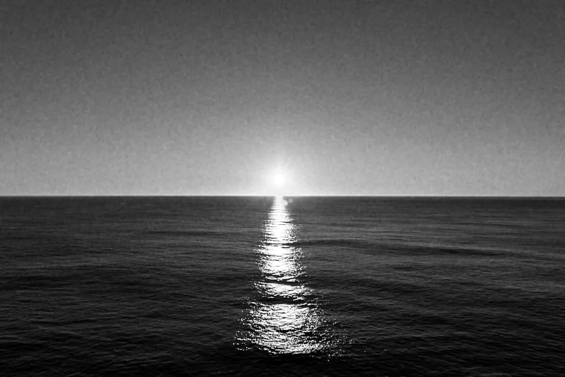 Midnight sun on the water