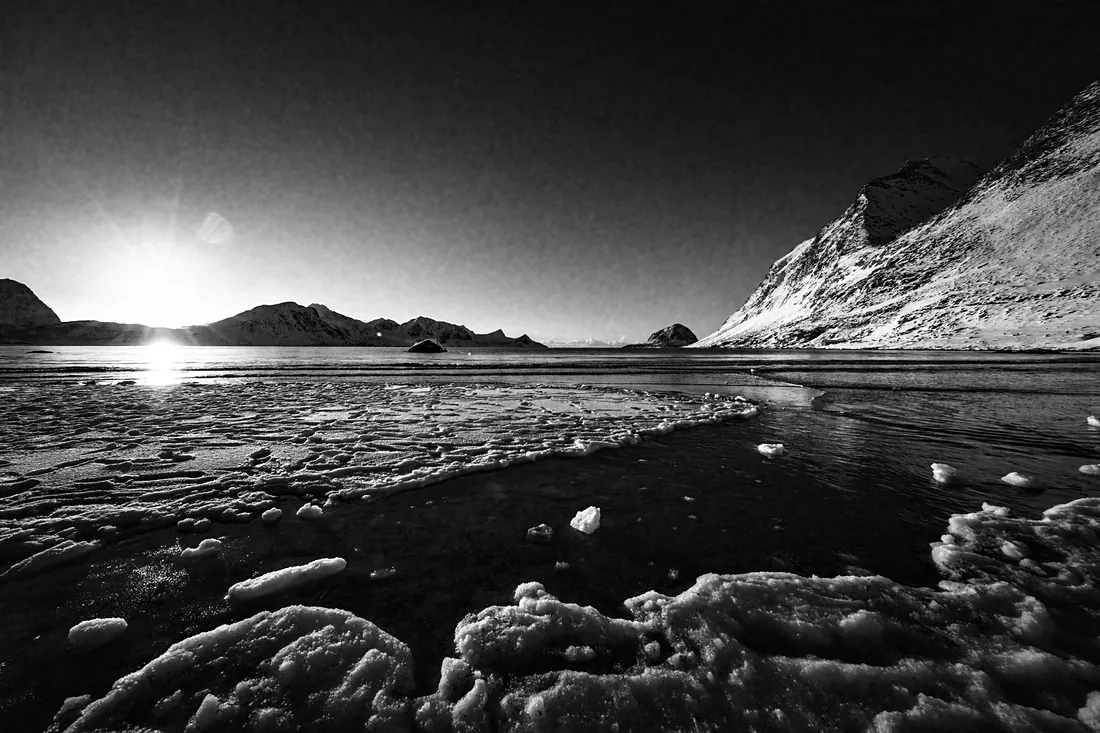 Low sun on the ice shore